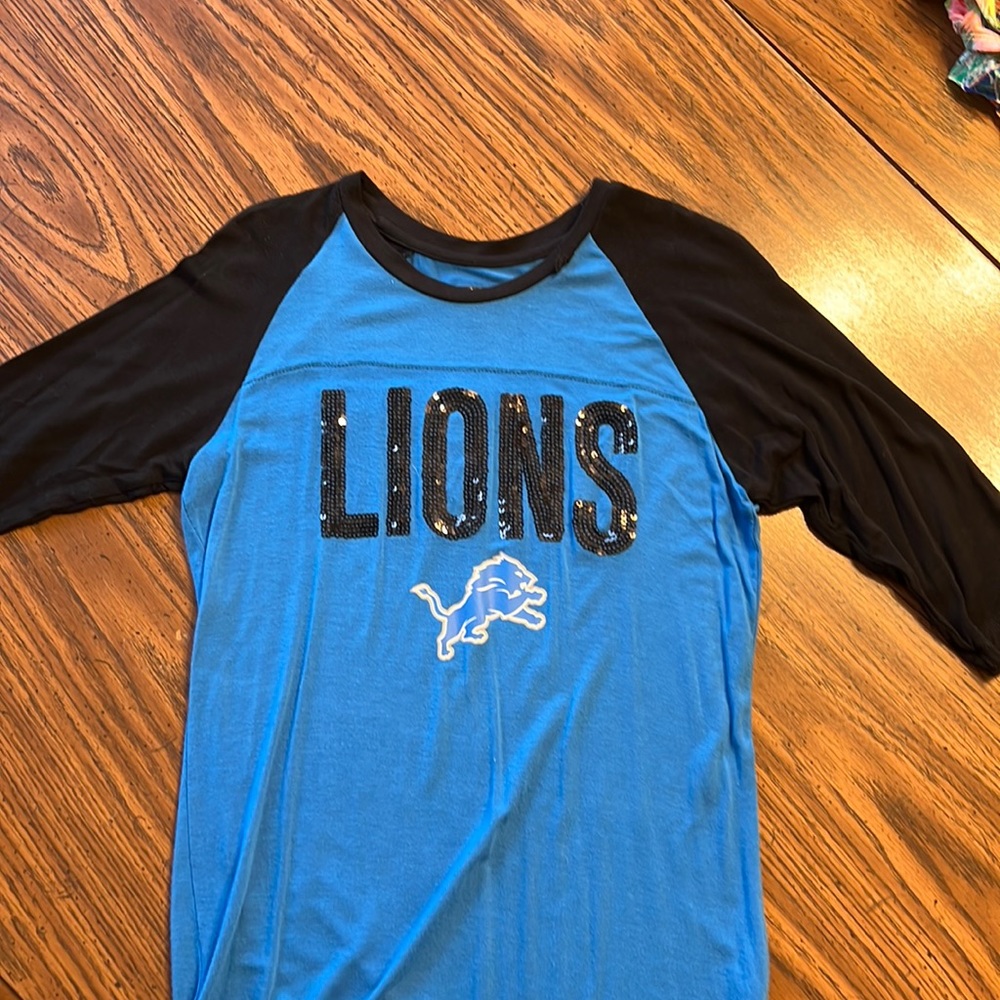 Lions 3/4 sleeve shirt.  Girls 10-12